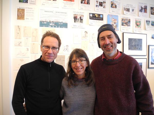 Artists Richard Mann, Willy Reddick and Wes Reddick, three of the four partners in Aarhus Gallery, were getting ready Thursday for the gallery's final event -- a farewell party put on by the community as a way to say thank you for the seven years of art and events. (photo by Abigail Curtis)